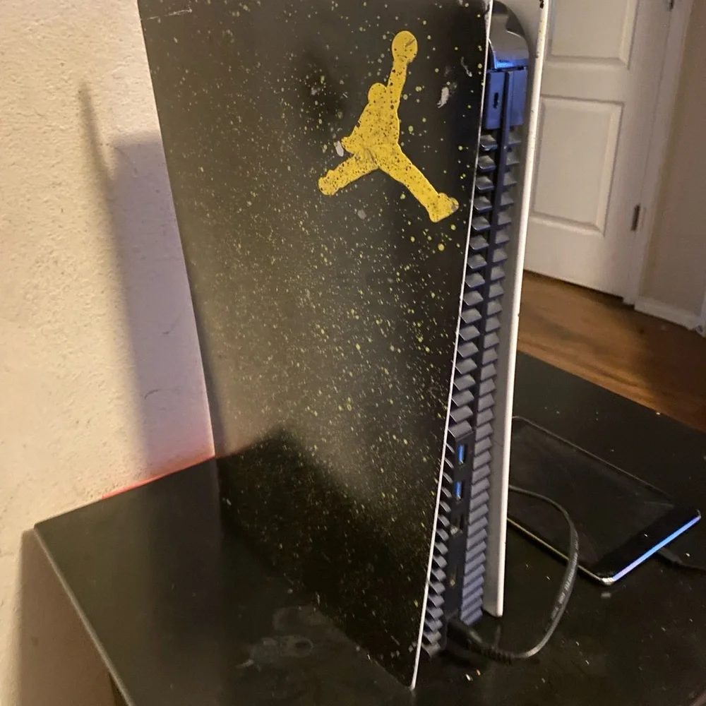 Yellow PlayStation Console with Jordan Logo